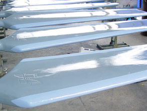 Cooling tower fan blades resurfaced and coated with corrosion resistant Belzona 1321